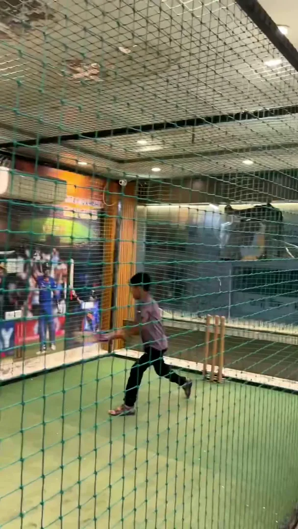 Kids playing box cricket in the indoor cricket net at Yey Kidzarea, Krishna Nagar