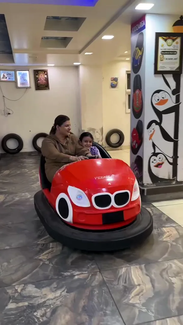 Child driving a bumper car at Yey Kidzarea